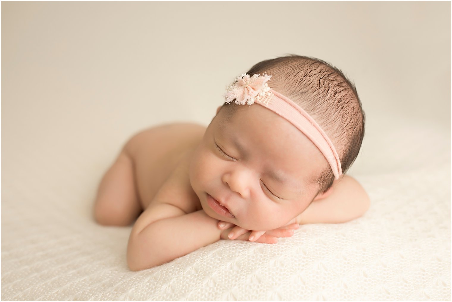 Newborn girl during studio session | Photos by Idalia Photography