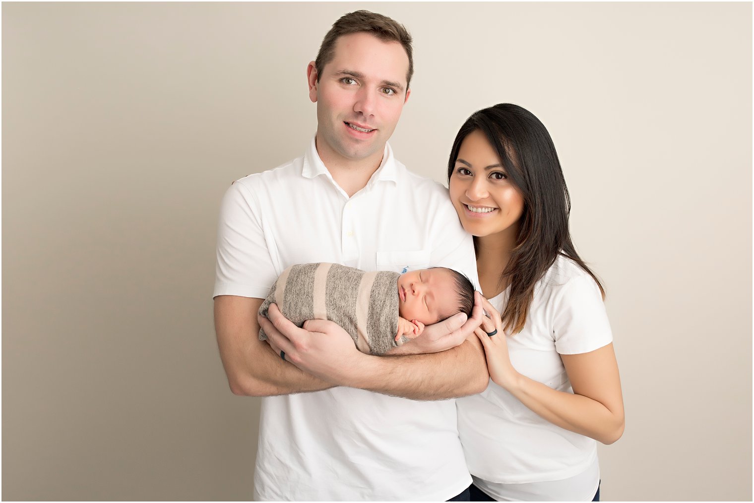 First-time parents with new baby | Photo by Idalia Photography