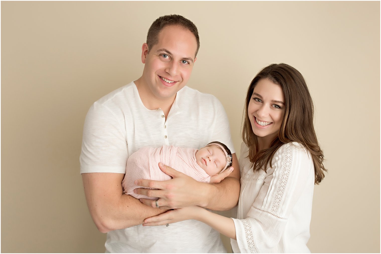 Parents and their newborn girl