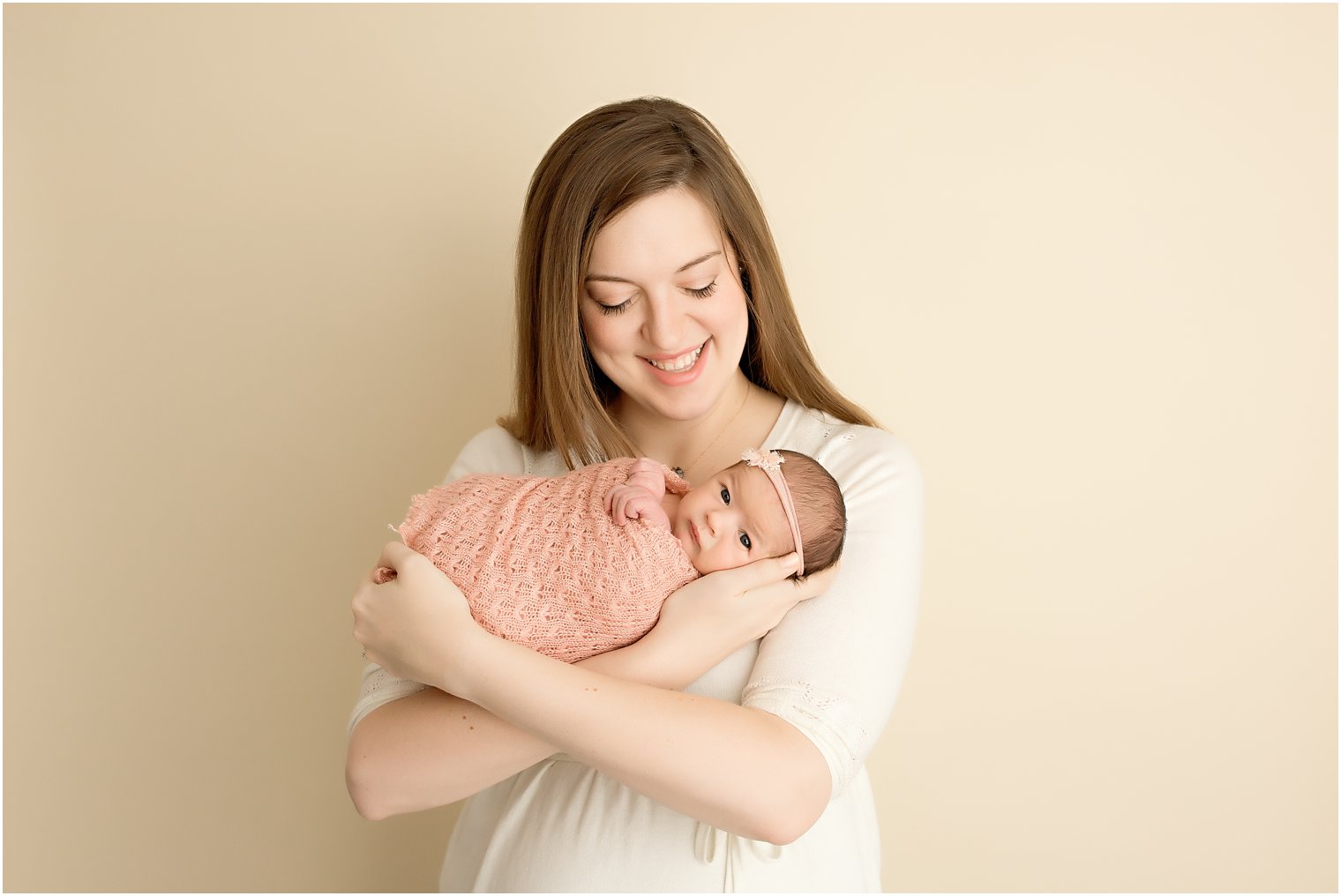 New mother and her daughter during newborn session