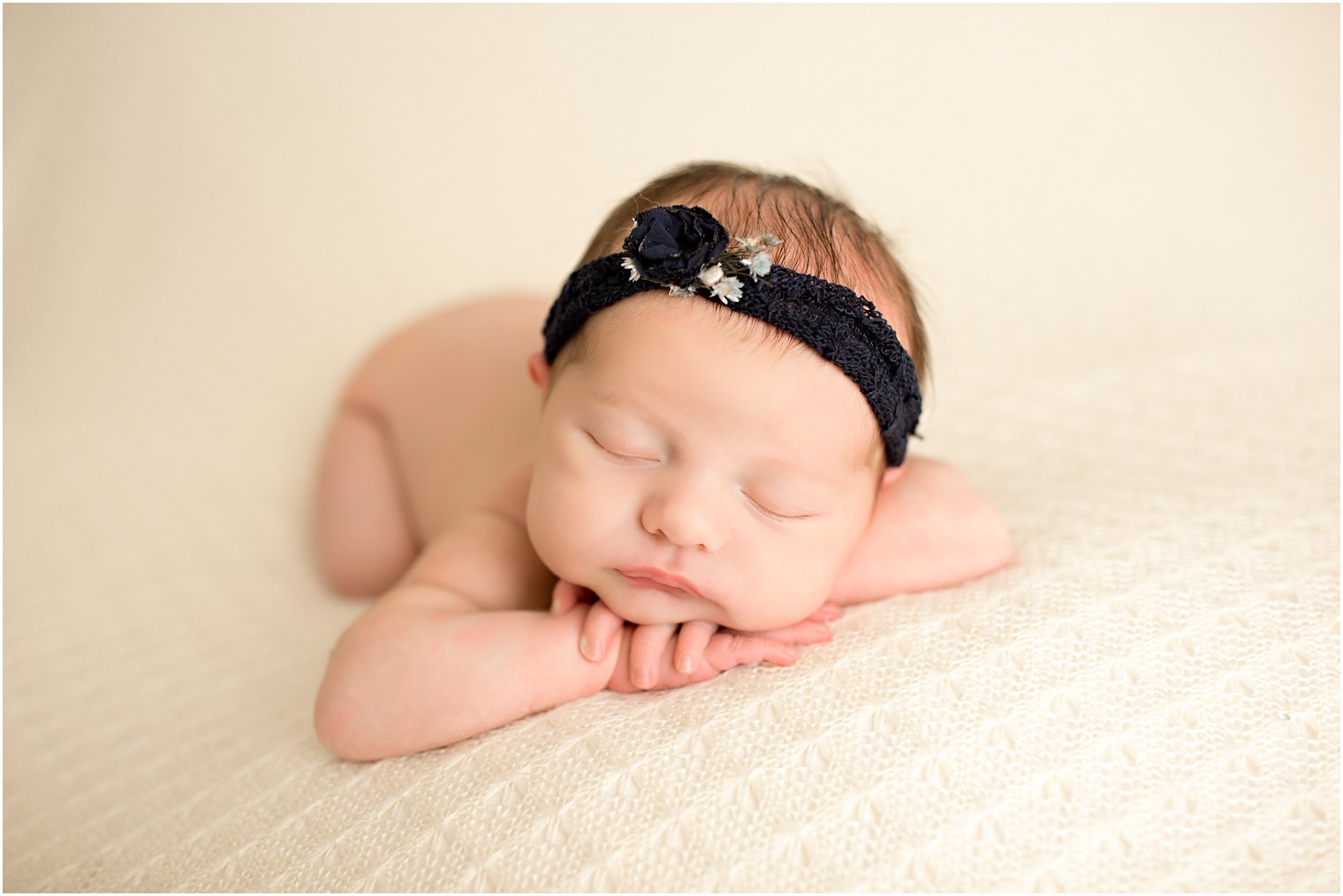 newborn baby girl with navy headband