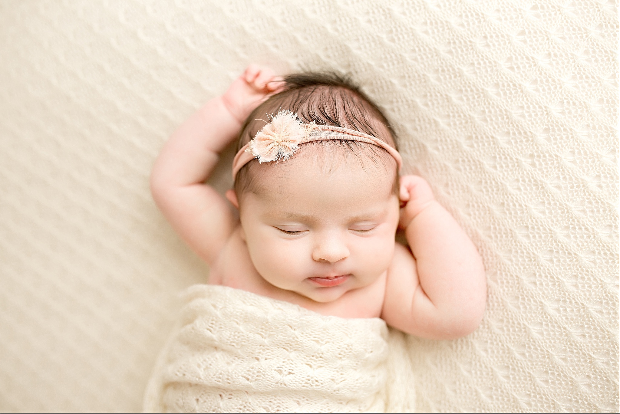 newborn baby girl sleeping during newborn session