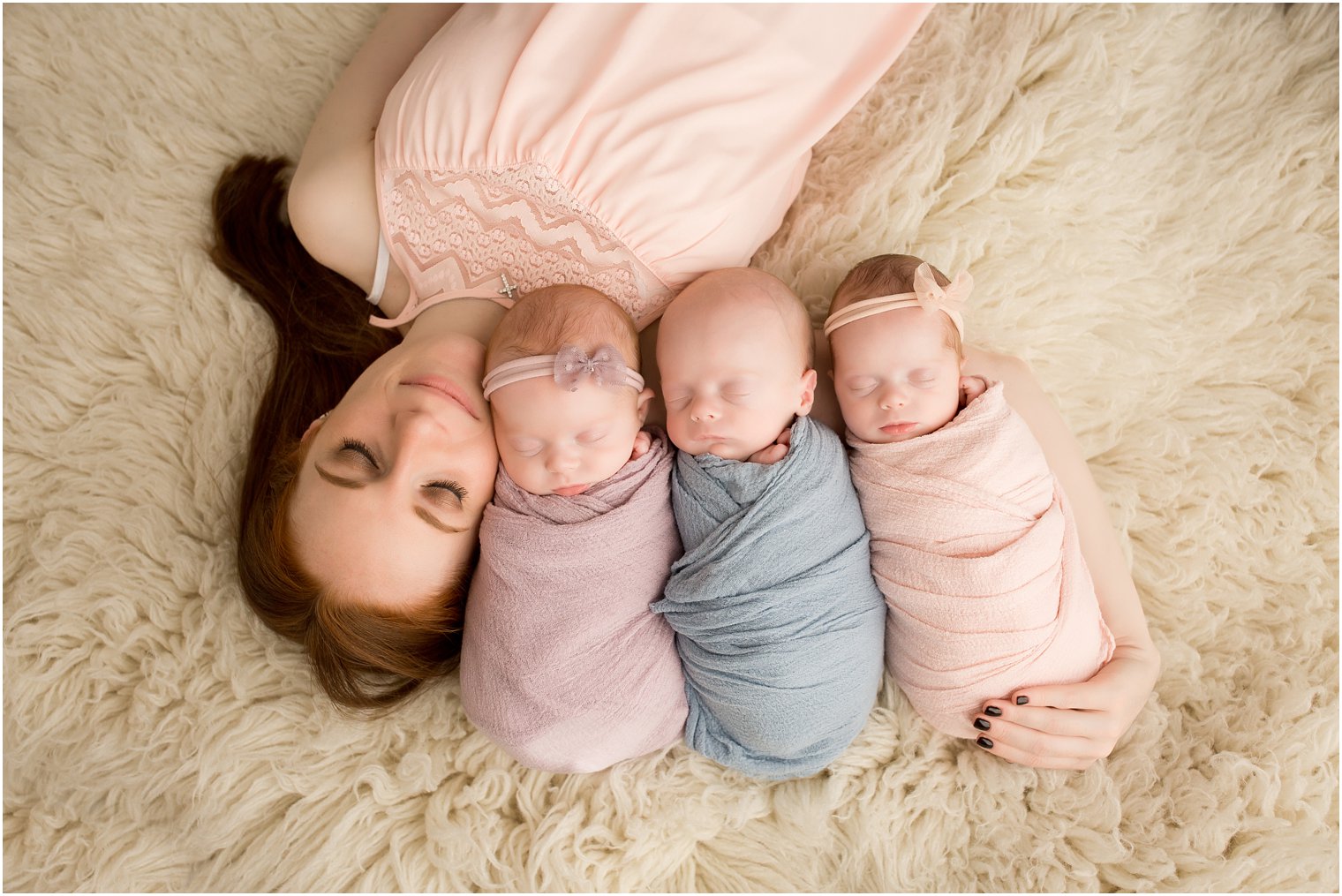Sweet photo of mom and newborn babies