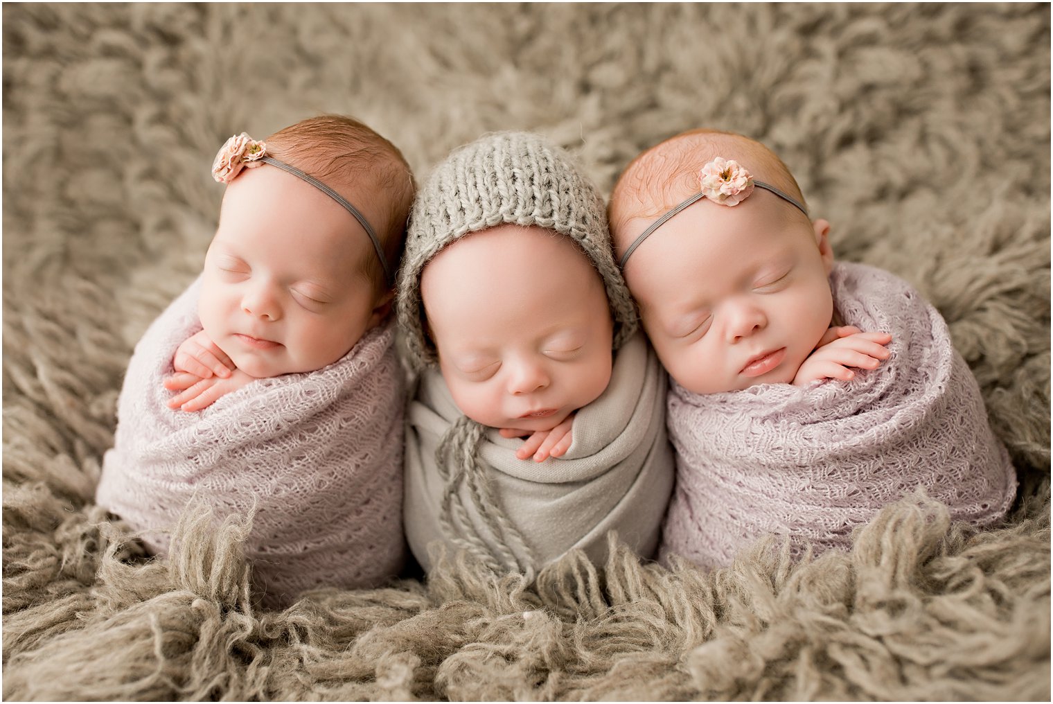 triplets during newborn session 