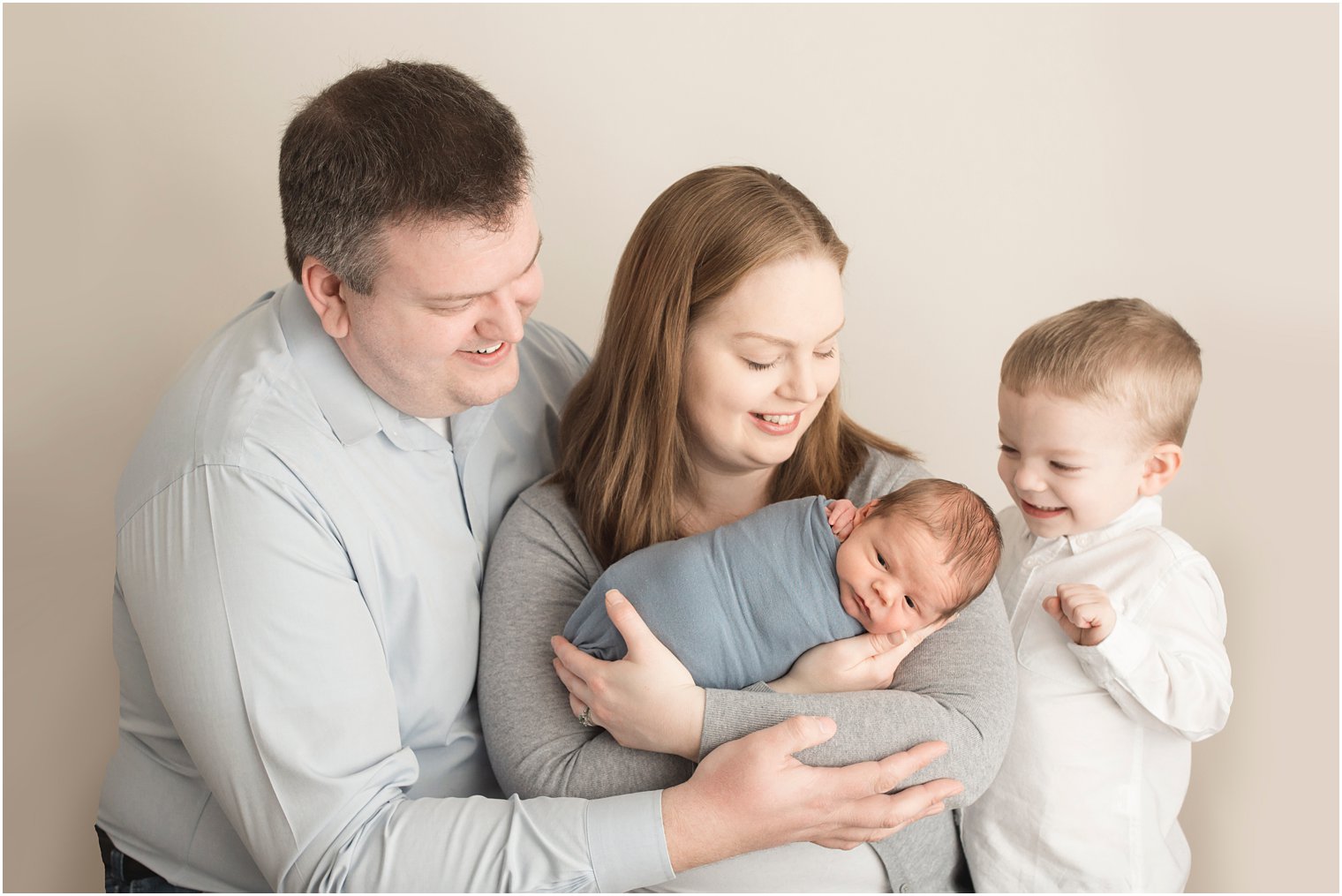 newborn session with toddler and parents