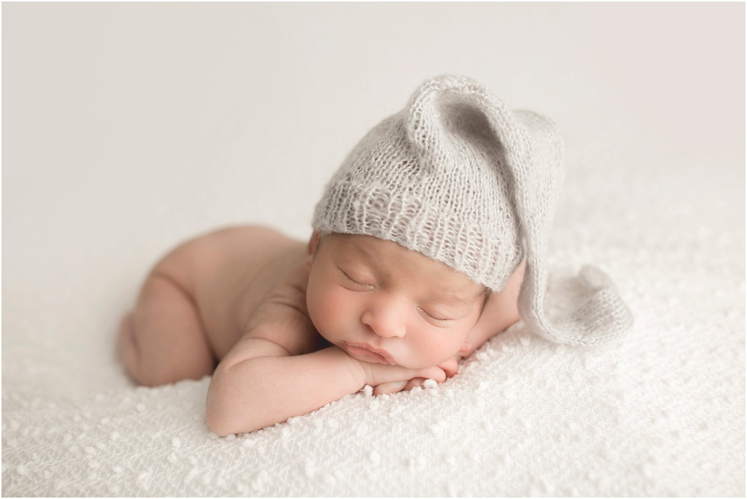 Newborn boy with sleepy hat