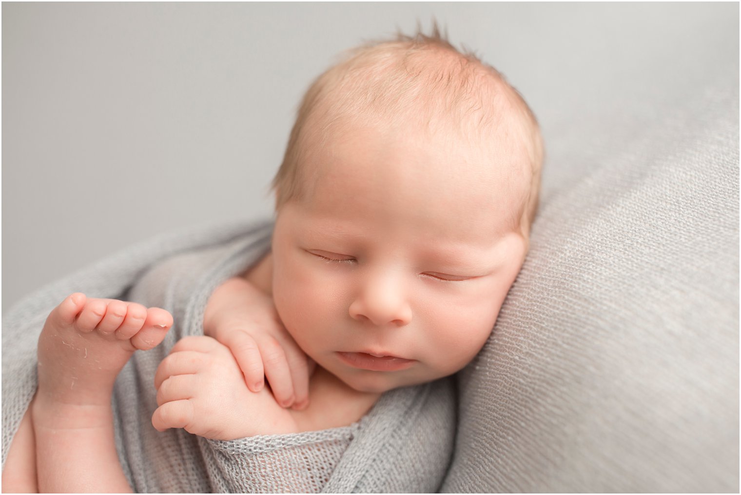 Sleepy newborn during newborn photo shoot | Red Bank NJ Newborn Photography by Idalia Photography