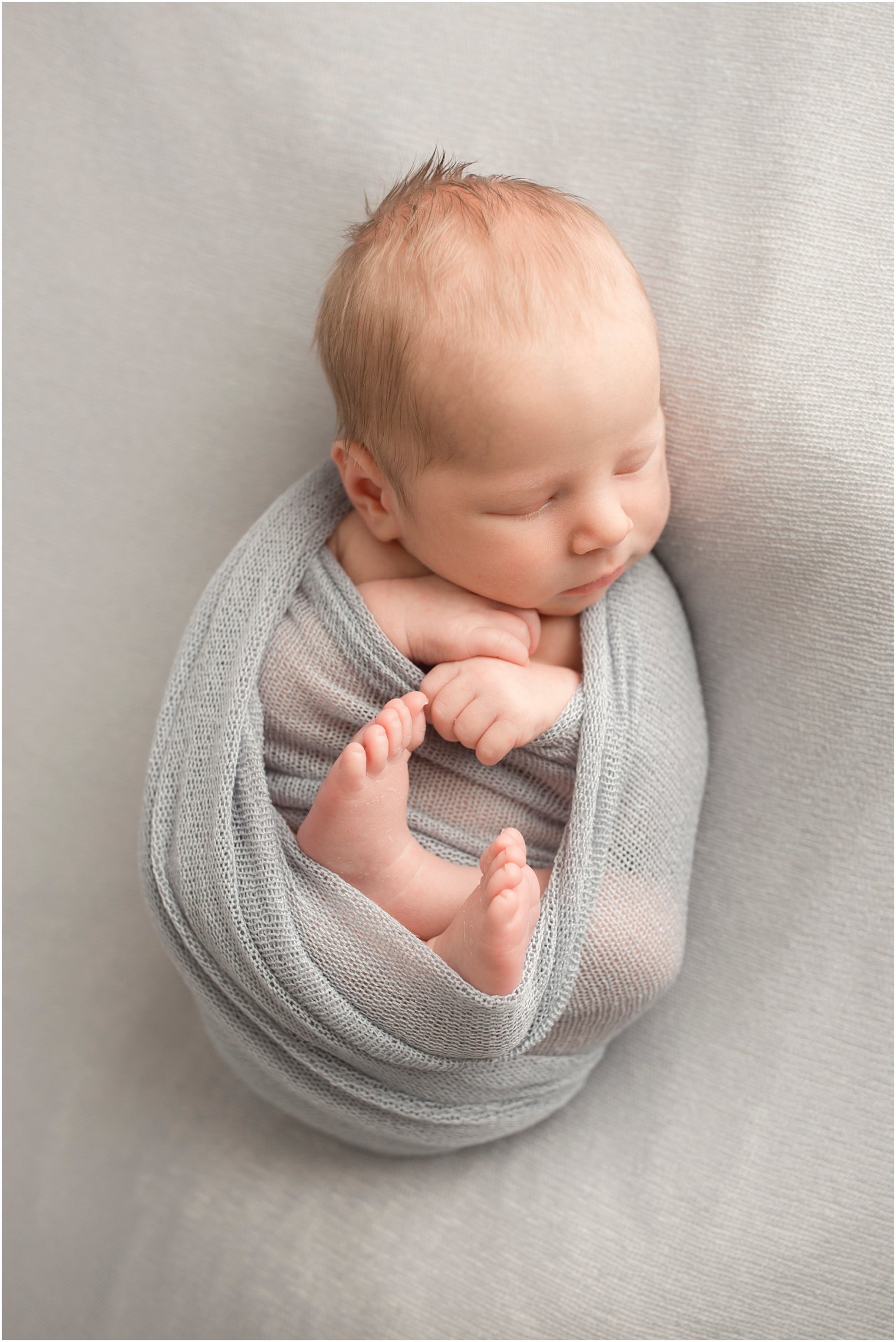 Newborn in blue gray blanket | Red Bank NJ Newborn Photography by Idalia Photography