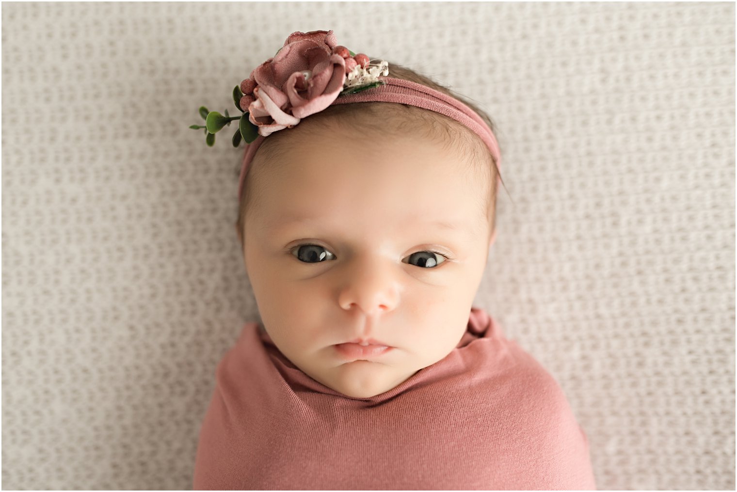 Alert newborn in mauve blanket | Burlington County Newborn Photographer | Newborn session by Idalia Photography