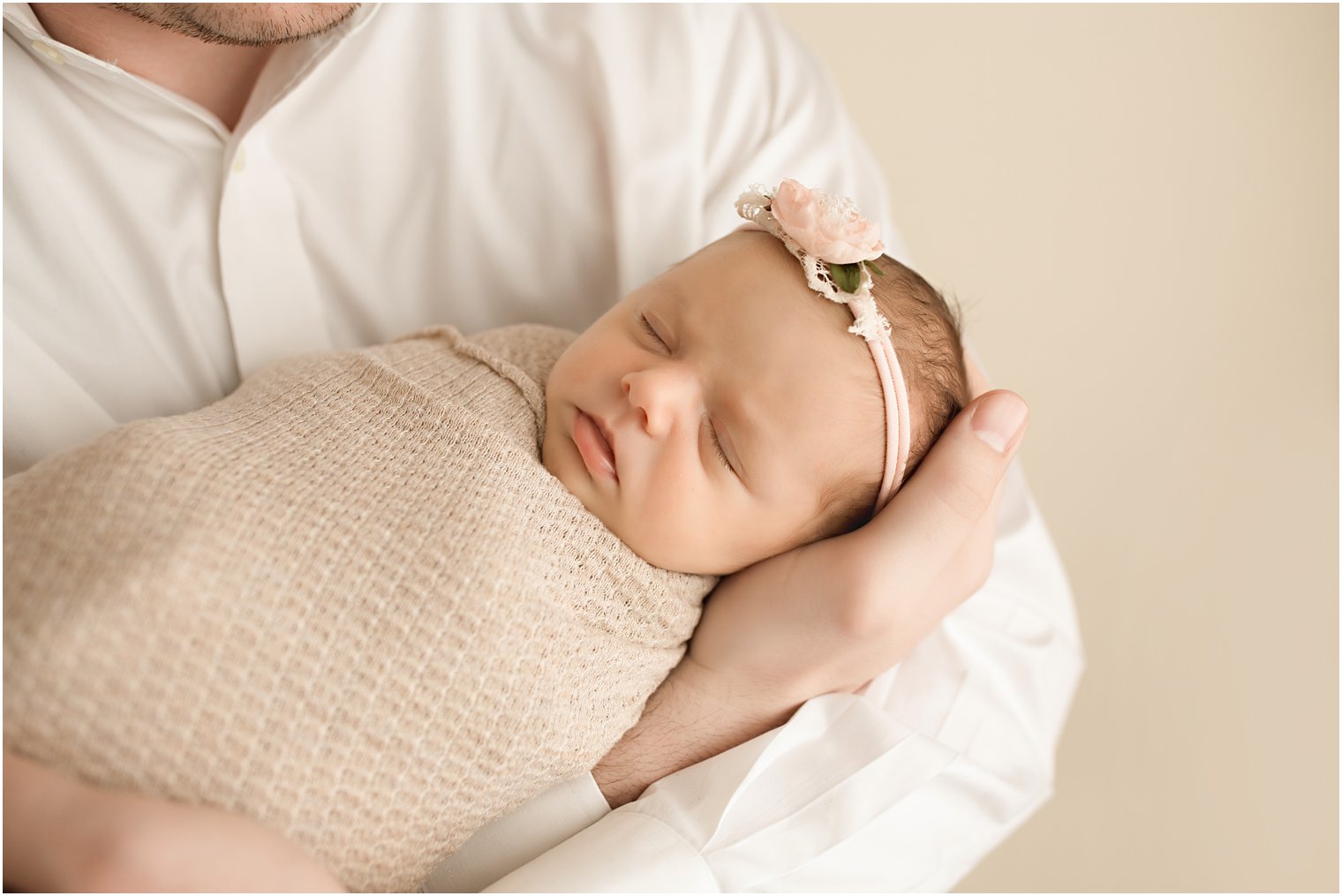 Newborn in father's arms | Burlington County Newborn Photographer | Newborn session by Idalia Photography