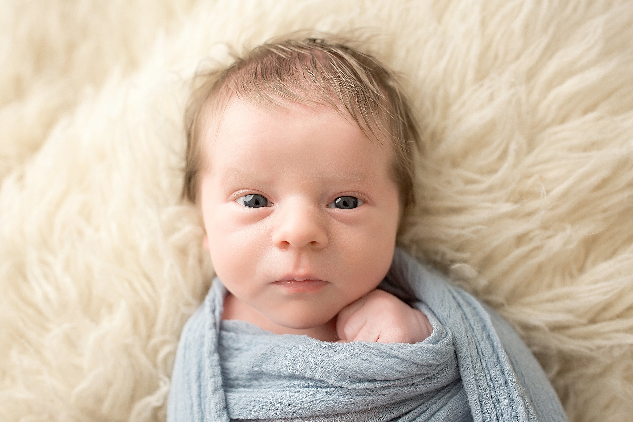 open eyed newborn baby boy