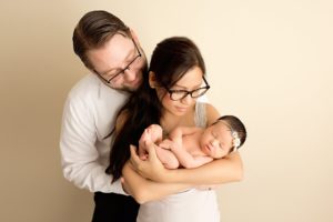 happy parents with new baby girl