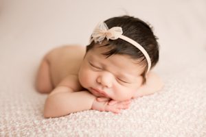 baby girl with ivory headband