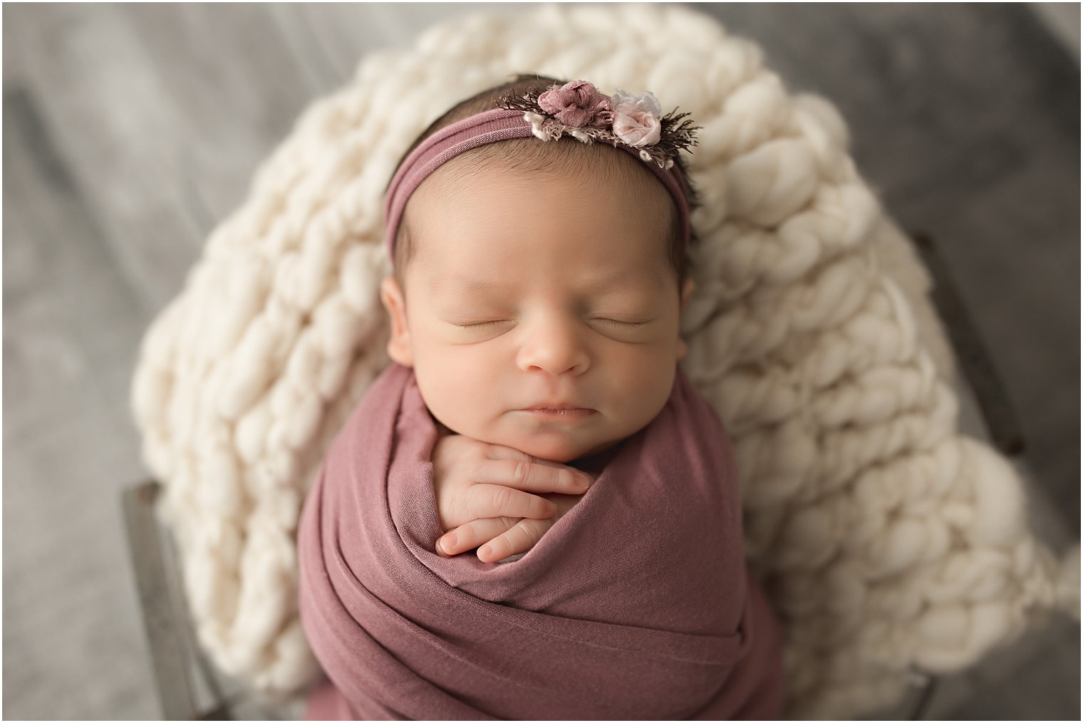 Wrapped newborn session with baby in a bowl | Photos by Newborn Photography