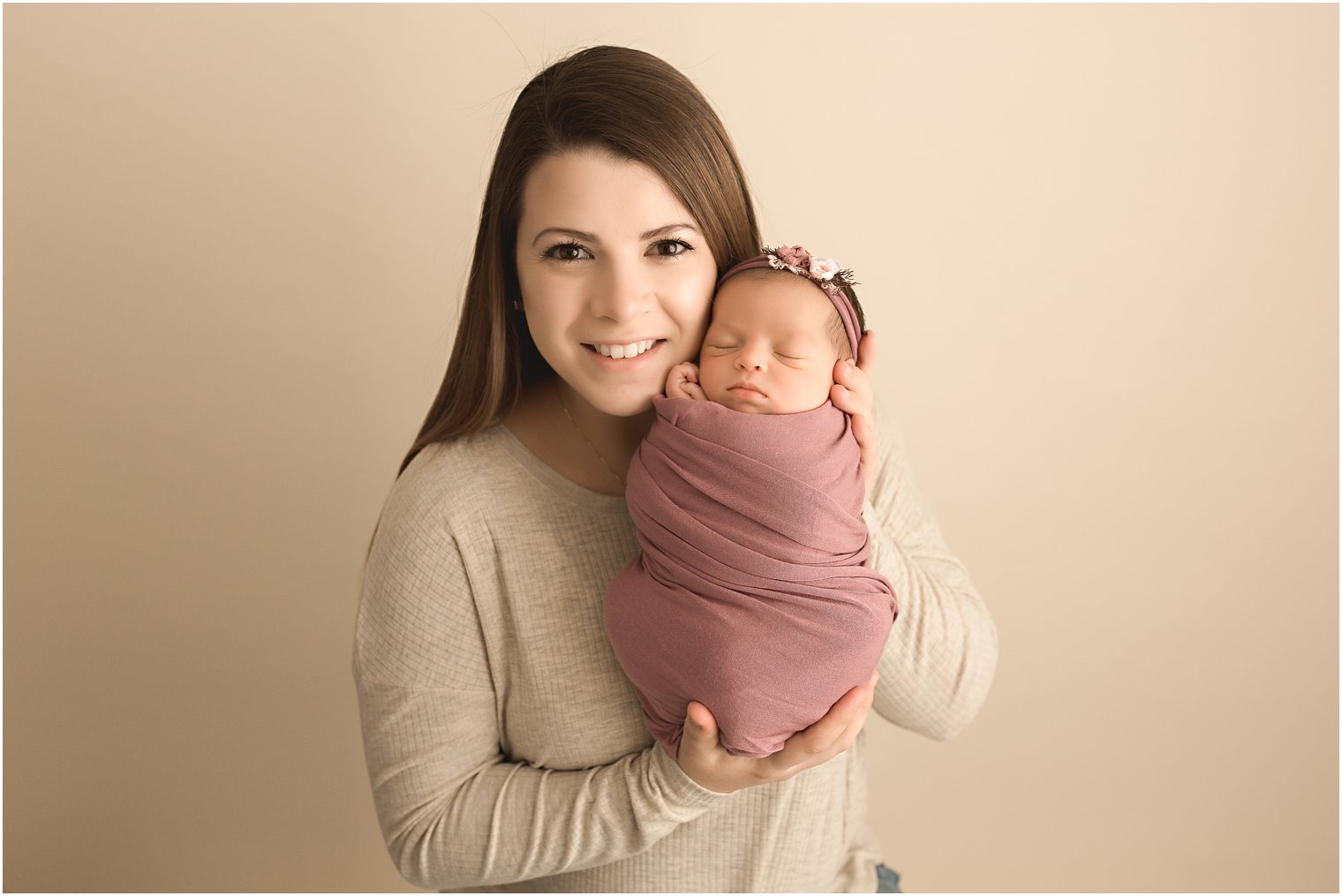 Newborn girl with her mother | Photos by Newborn Photography