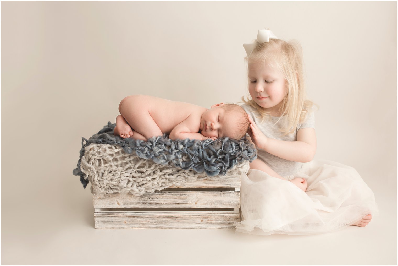 Older sister with newborn brother | Red Bank NJ Newborn Photography by Idalia Photography